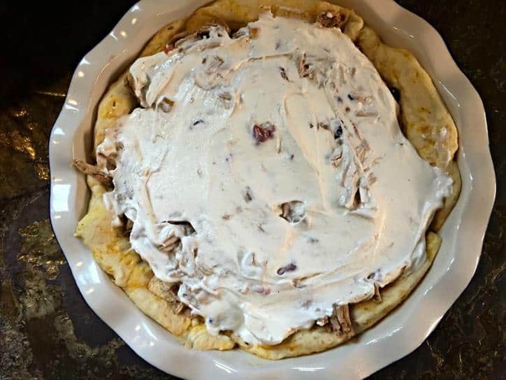 Add sour cream on top of chili