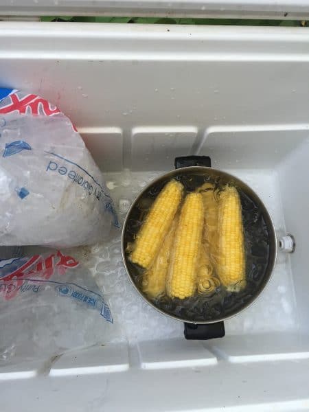 Icing the corn down to stop the cooking process
