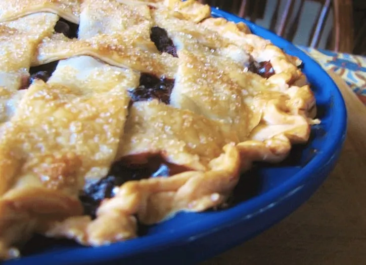 Close up of the browned crust with sugary sprinkle