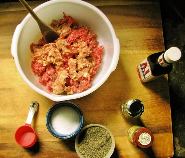 view from above of ground beef and seasoning for hangry hamburger recipe