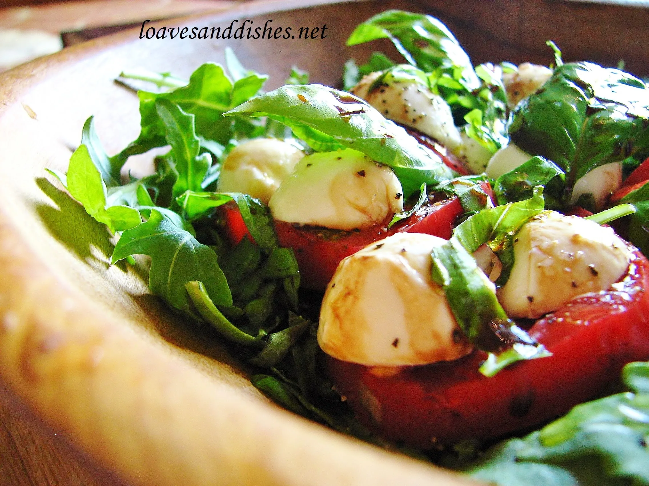 arugula salad with mozzarella, tomato and balsamic dressing