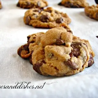 Peanut Butter Chip Chocolate Chip Cookies on parchment papers