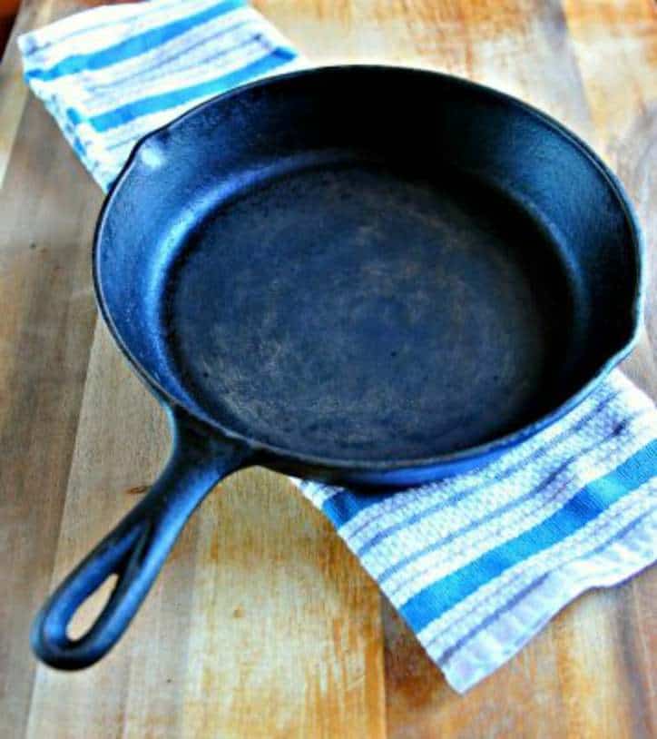 A photo of a rusty skillet for how to season a cast iron skillet