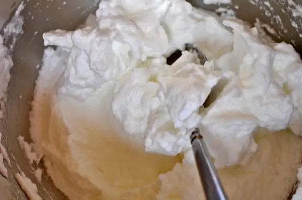whipped egg whites in a bowl