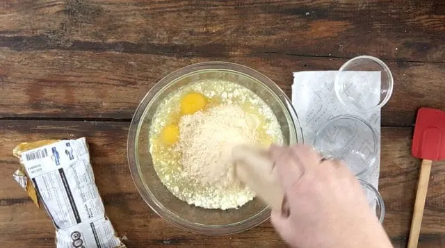 A photo of adding a packet of instant pudding to the mix