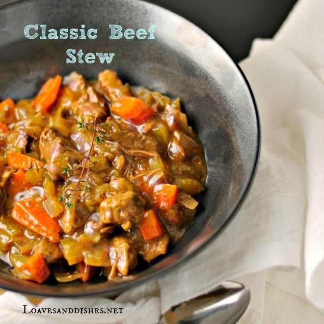 A black bowl of classic beef stew that is a pinnable image for pinterest that says "classic beef stew" and the website name on the photo