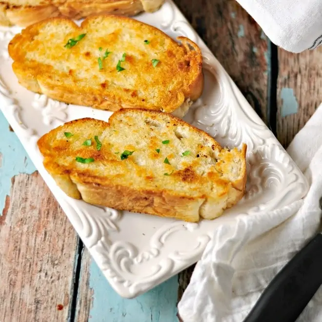 A photo of 4 Ingredient Easy Texas Toast sitting on a long rectangular dish