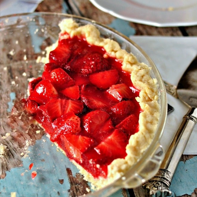 two large slices on a glass pie plate with pie server