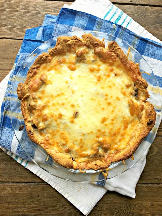 A photo from above of Taco Pie sitting on blue towel