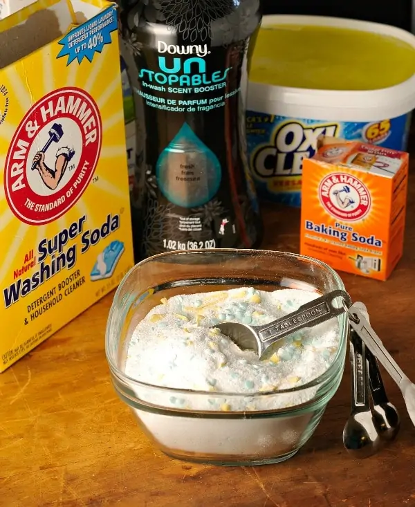 Photo showing the ingredients in their boxes with a bowl of washing powder