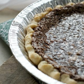 A photo of the glistening edge of the CHOCOLATE CHESS PIE