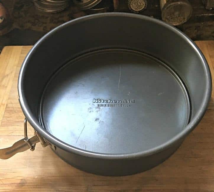 A photo of a spring form pan for Cinnamon Roll Cake from Scratch