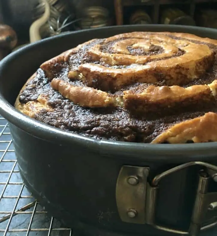 A photo of the baked cake from the side with the levels in it