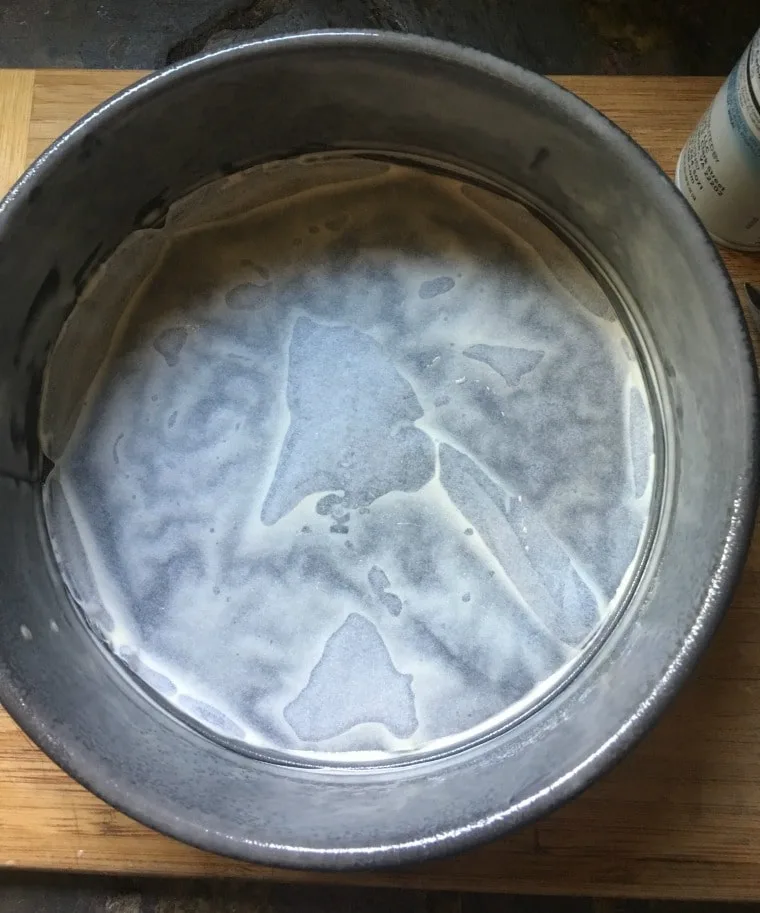A photo of the parchment paper circle in the bottom of the springform pan