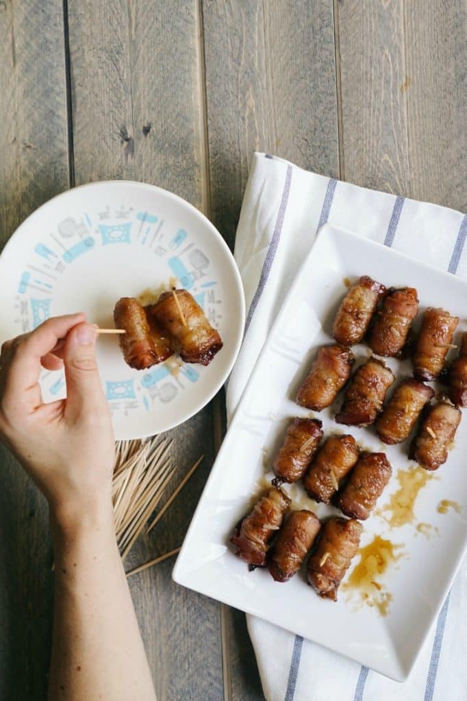 A photo of the completed smokies on a plate with a toothpick