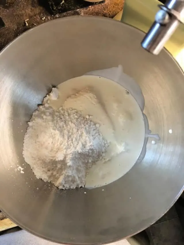 ingredients in the bowl of a stand mixer for fruit dip