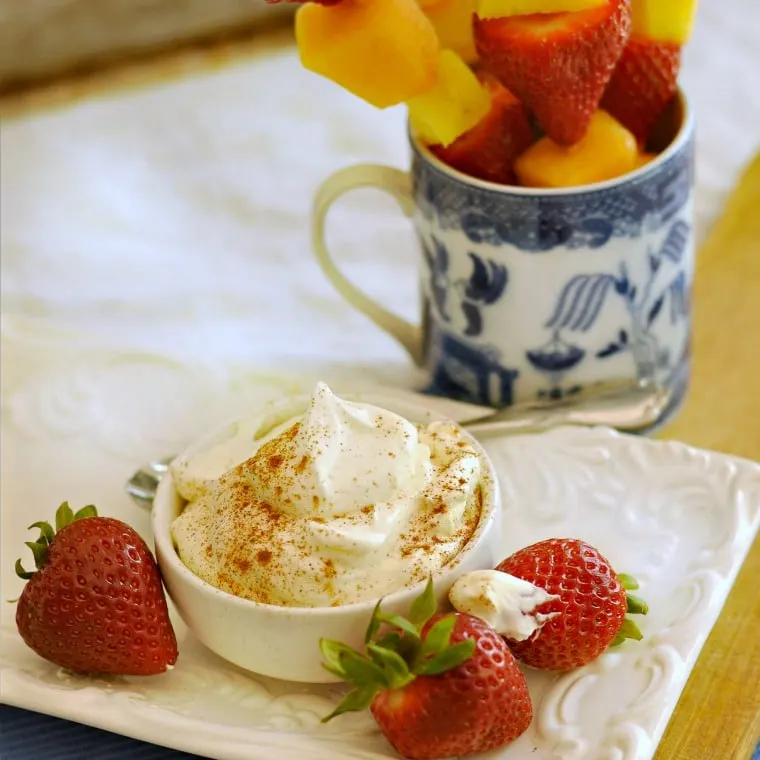 bowl of sour cream dip with fruit