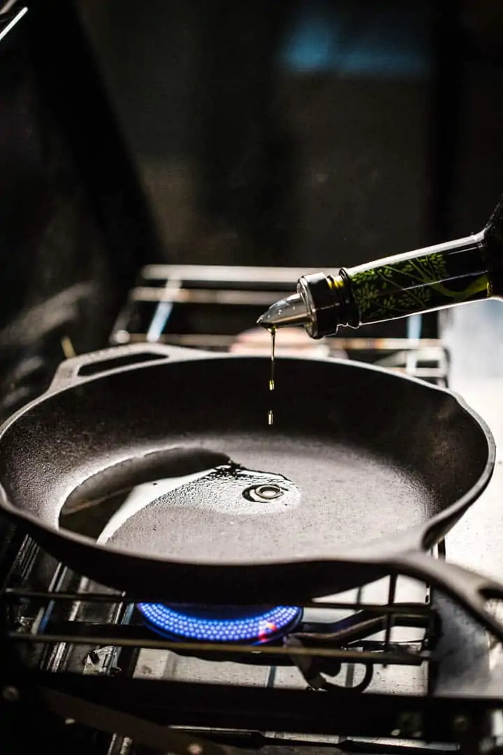 A photo of oil heating in the pan