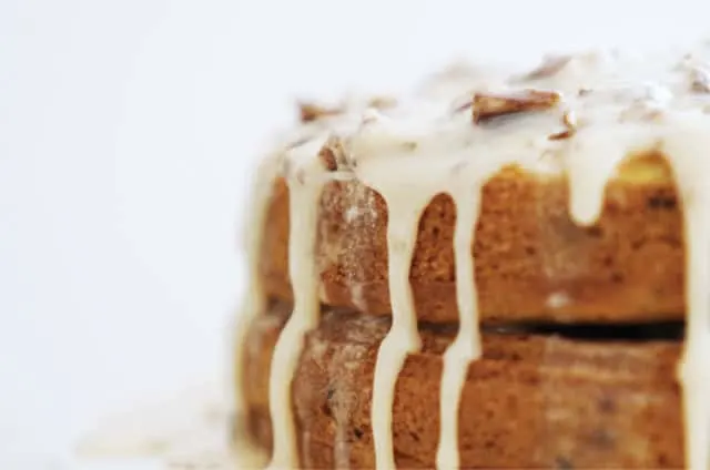 A view of the icing running down the sides of the pumpkin praline cake