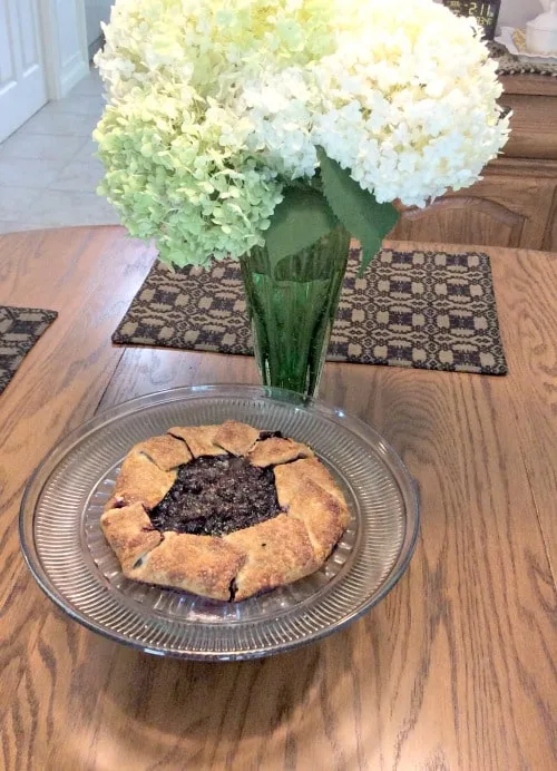 A photo of a rustic blueberry galette made by reader Maria!