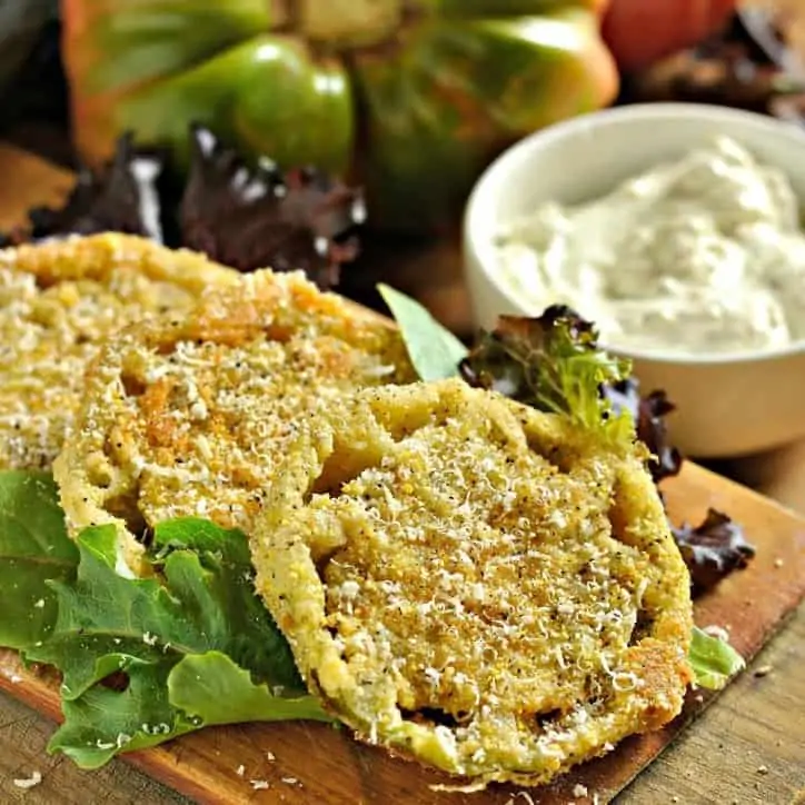 Easy fried green tomatoes on a cutting board