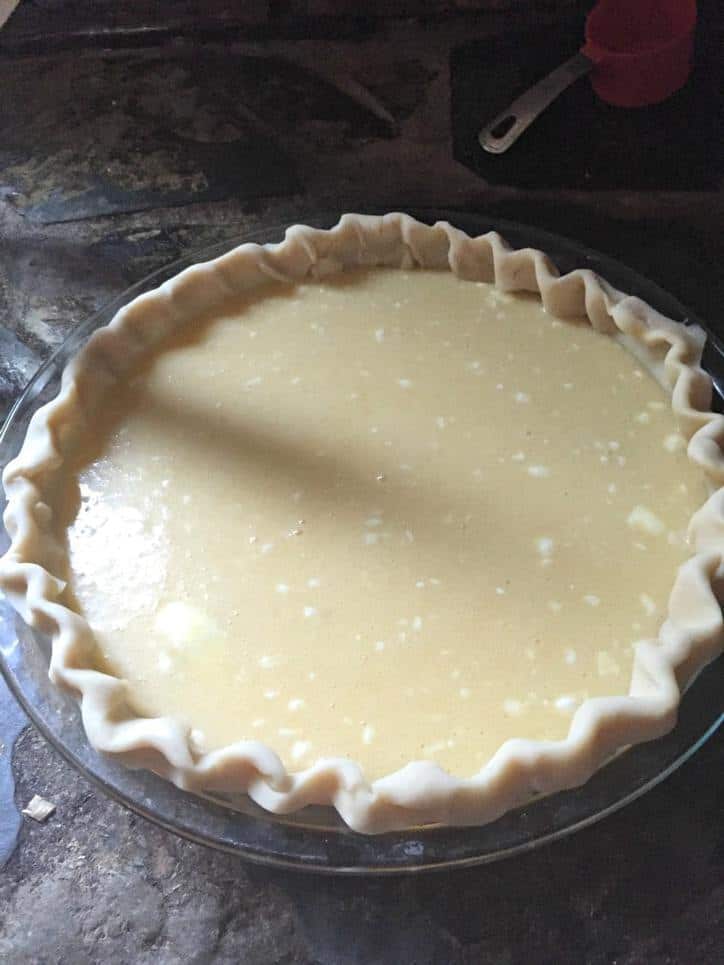 The pie ingredients inside the prepared pie shell ready for the oven