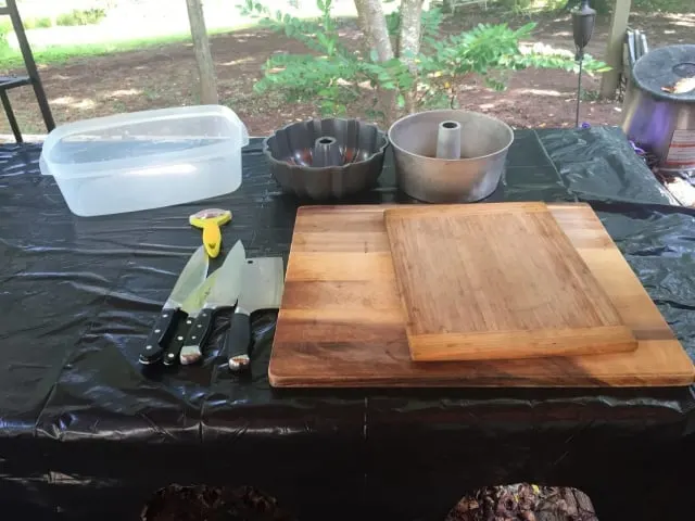 cutting board, knifes, containers assembled for project