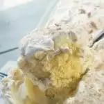 Banana Pudding Poke Cake scooped fully from the pan
