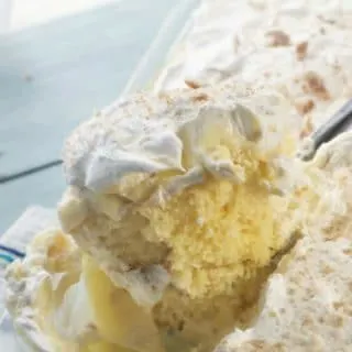 Banana Pudding Poke Cake scooped fully from the pan