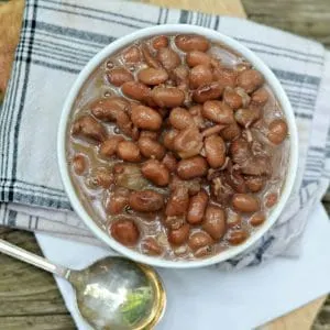 A view from above of a bowl of beans for HOW TO COOK PINTO BEANS ON THE STOVE TOP