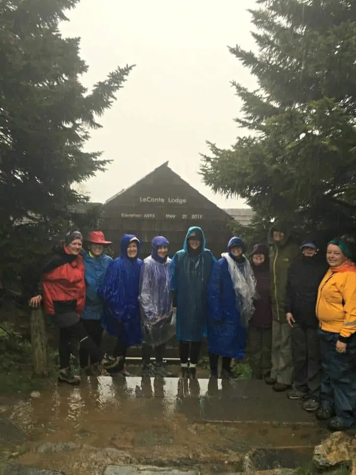 This is a photo of the hiking group in front of Mt. Leconte lodge in the pouring rain