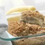 a photo showing a spatula full of the Easy Cheesy Southern Squash Casserole