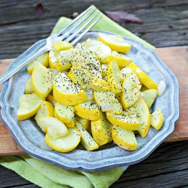 Sauteed Squash on silver plate.