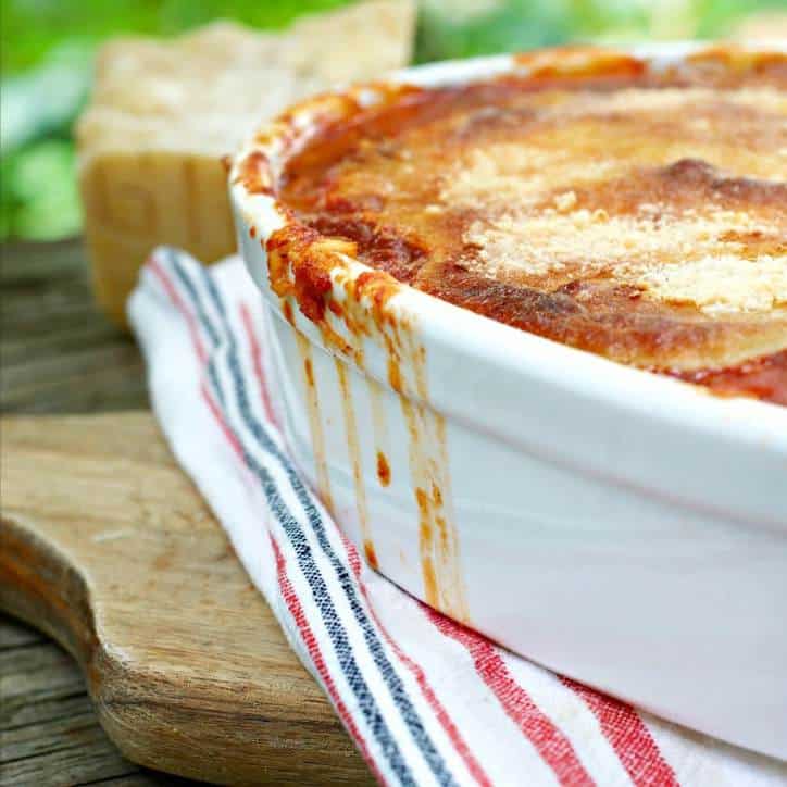 This is another photo of the pan with sauce running down the side for Fried Green Tomato Parmigiana