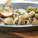 A very close up photo from the side of Southern Fried Potatoes and Onions