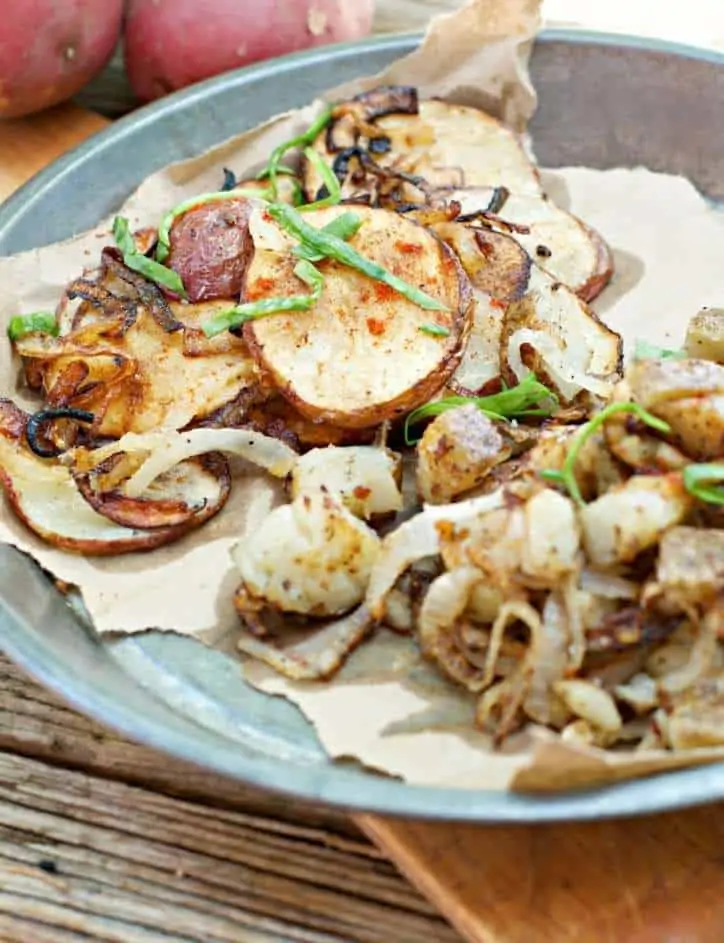 A very close up photo from above of the chip sliced Southern Fried Potatoes and Onions