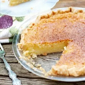 This is another photo of the Old Fashioned Lemon Chess Pie with a slice out and it is turned so you can see the inside of the pie