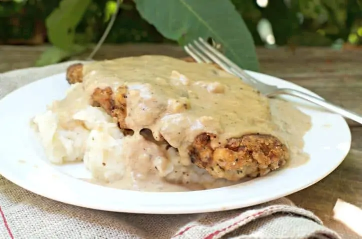 a photo of The Secret to Perfect Chicken Fried Steak with sunlight shining on the gravy