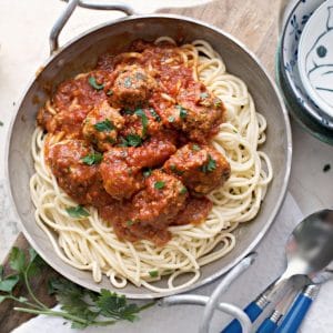 meatballs on spaghetti in a dish