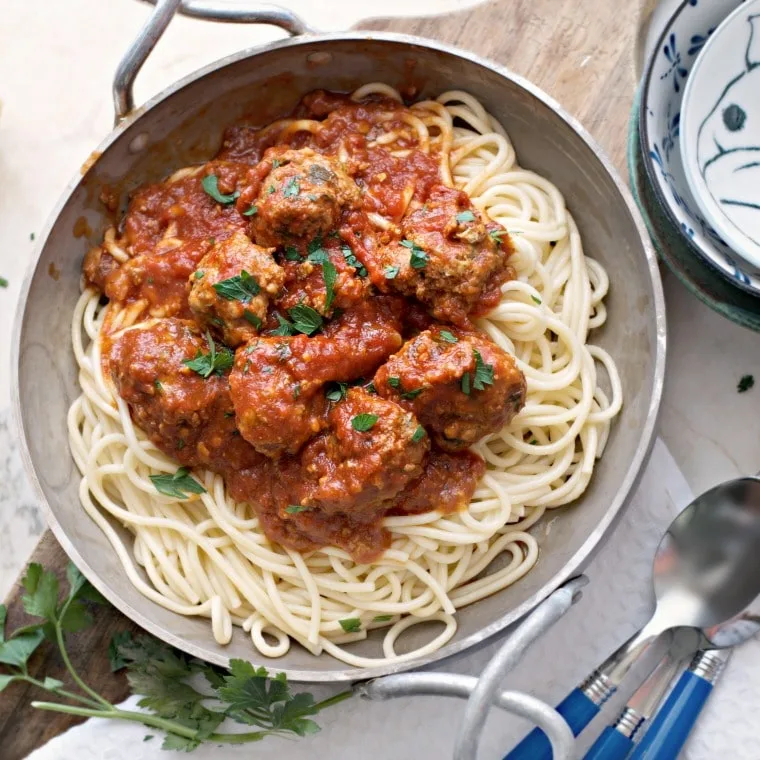meatballs on spaghetti in a dish