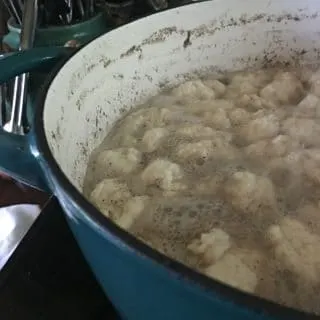 An upclose look at the dumplings as they cook on the stovetop. See how they float and kind of bubble up?
