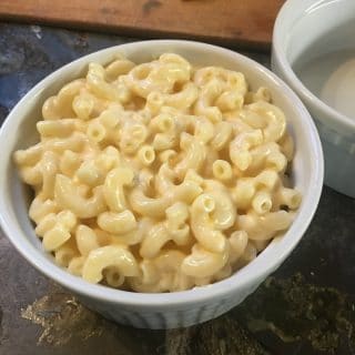 macaroni and cheese noodles filled to top of the ramekin