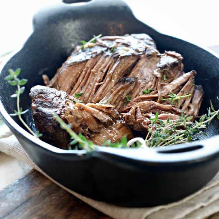 A close up photo from the end of a glistening and beautiful ALL THE SECRETS TO PERFECT CROCKPOT POT ROAST