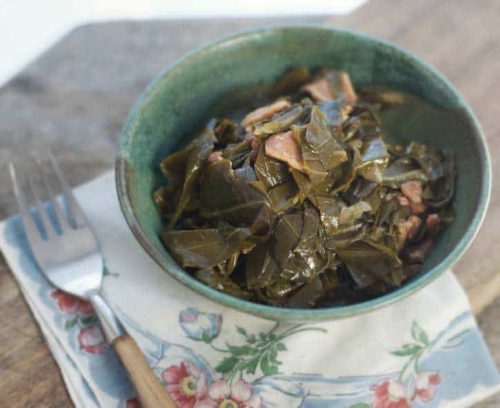 An overhead view of a bowl of greens for THE SECRET TO PERFECT SOUTHERN COLLARD GREENS