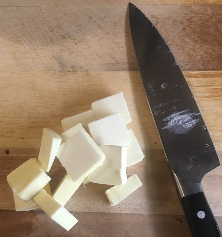 A photo of cut up butter