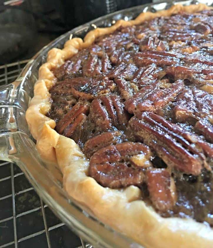 A close up shot of the side of the Kentucky Bourbon Pie with sunlight glistening on the top.