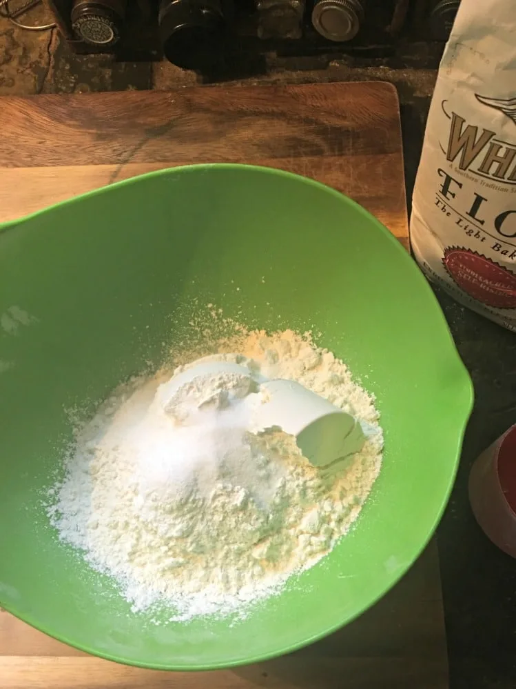 A photo showing the dry ingredients together in a bowl for Southern Buttermilk Biscuits