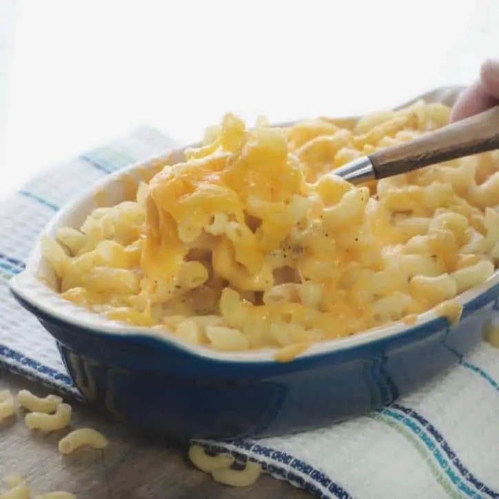 A photo of the macaroni and cheese being scooped from the dish