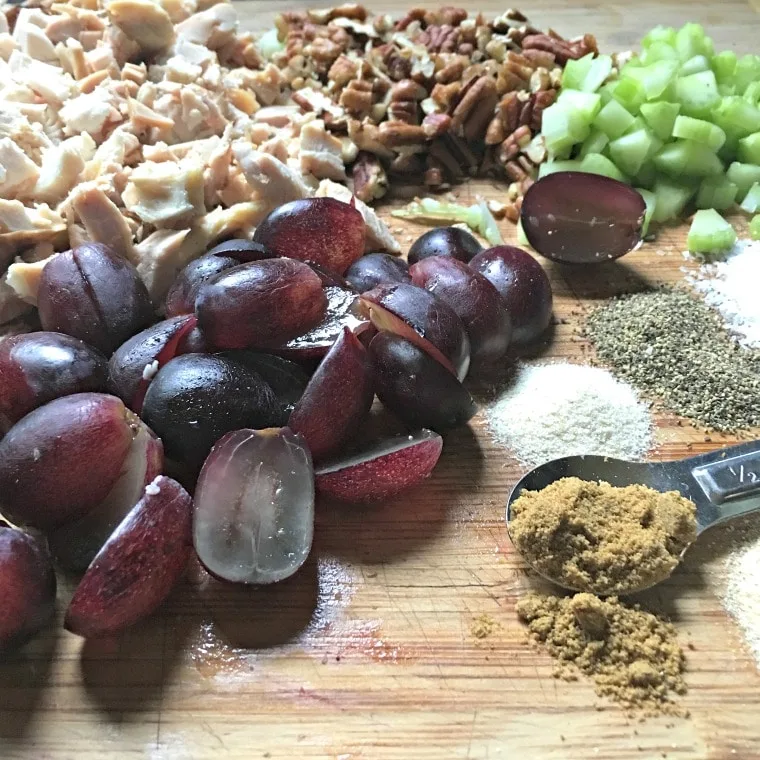 A photo of the chopped ingredients on cutting board with measuring spoon.
