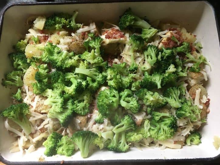 broccoli on the top of the casserole in the baking dish